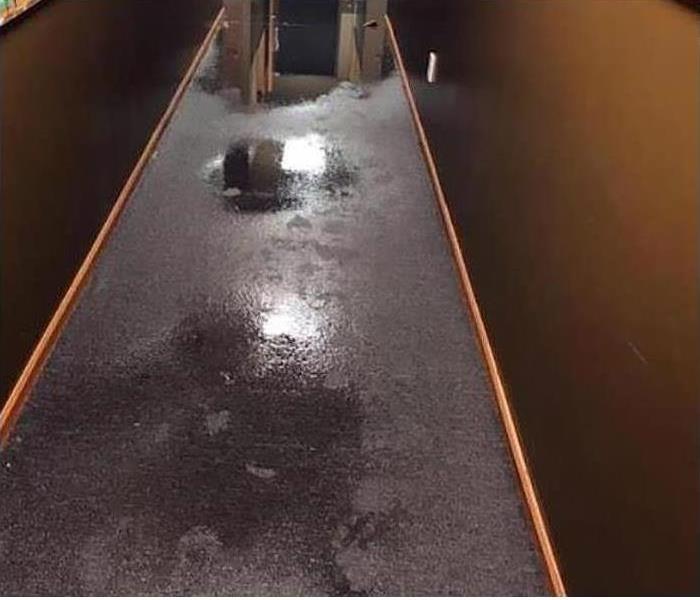soaked carpet in corridor