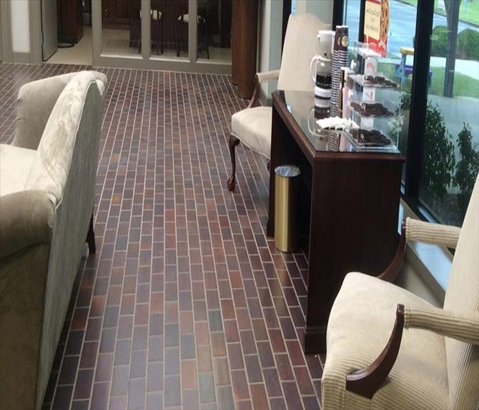 tiled pavers, coffee station and sofa, all dry for the customers
